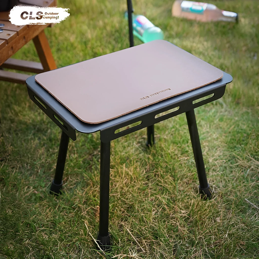 Aluminium dual-use folding camping stool that converts to a small table, shown with tactical storage bag.