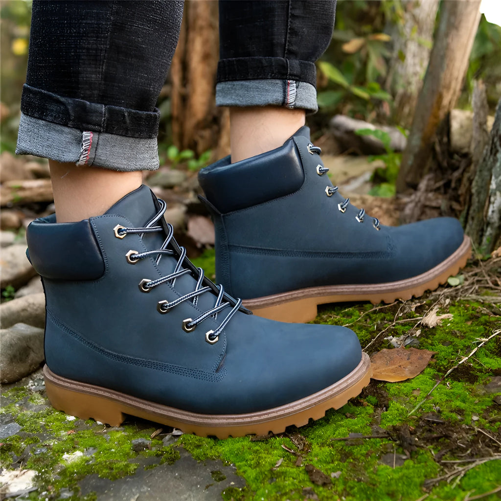 Pink men's high-top Martin boots with front laces and a round toe, showing the velvet lining.