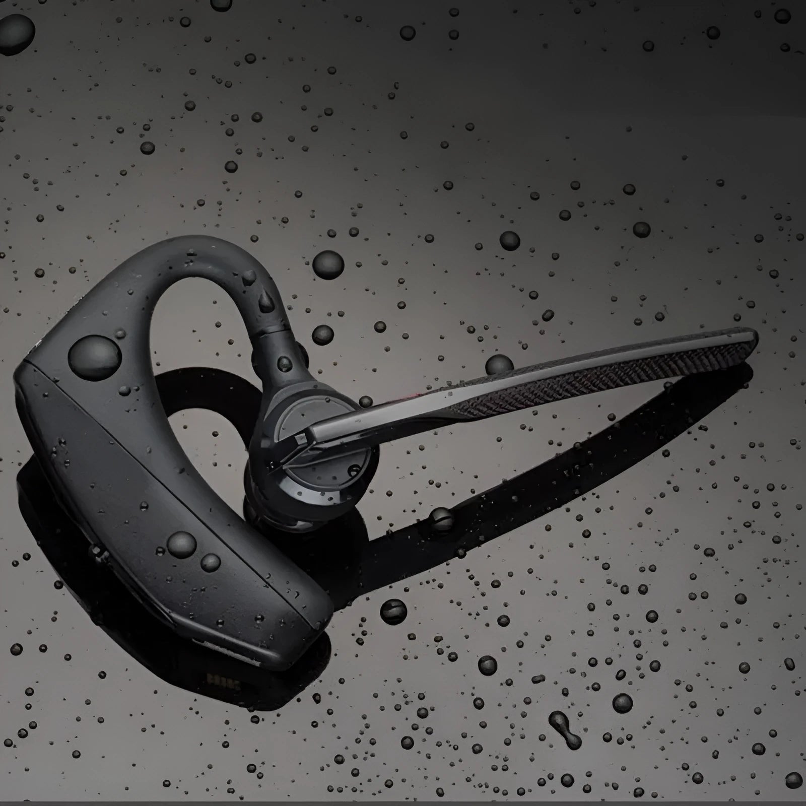 Black stereo Bluetooth sports headphones with a battery display on a plastic headband.