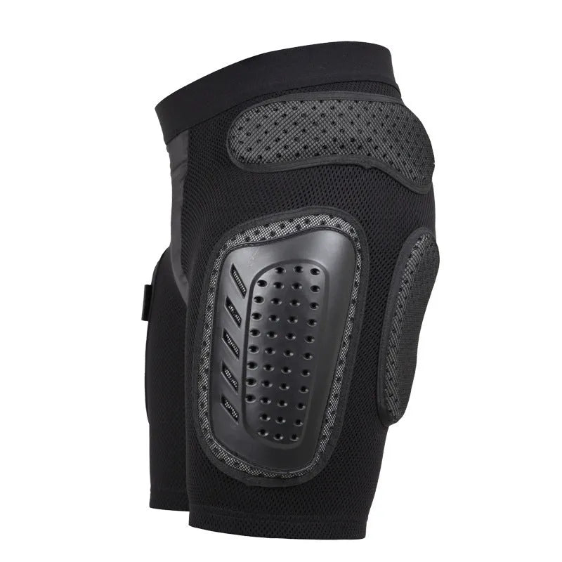 Black cycling hip protection pants showing hip pad placement, labelled with available sizes S, M, L, XL.