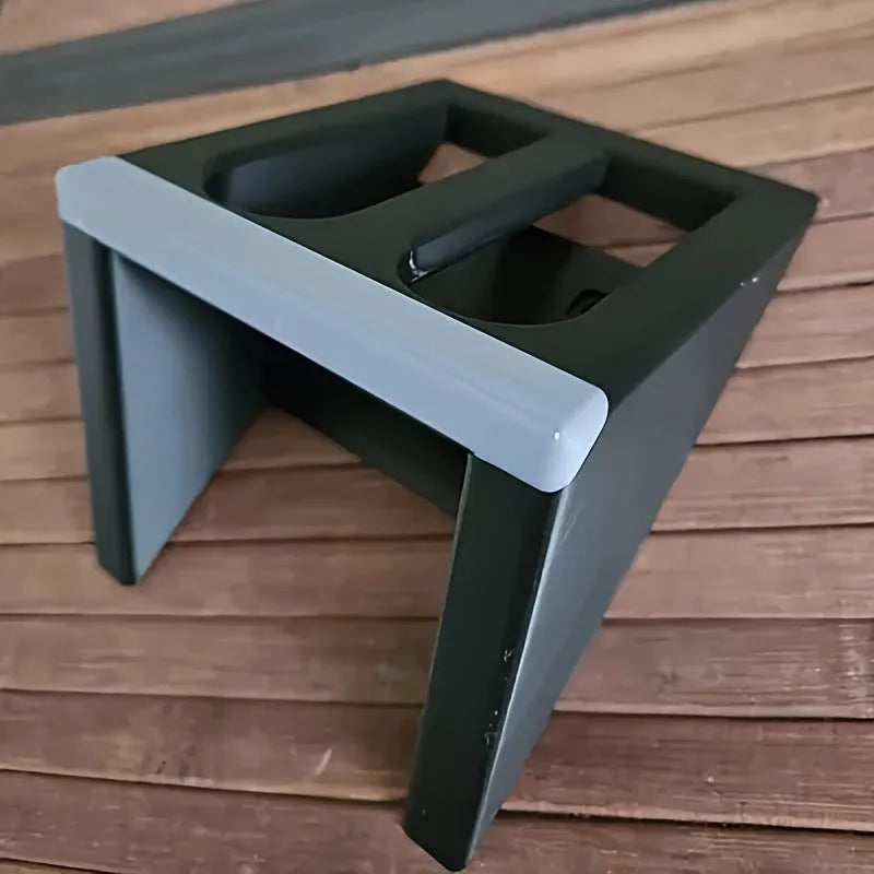 Black plastic punk-style pistol stand for replica firearm display