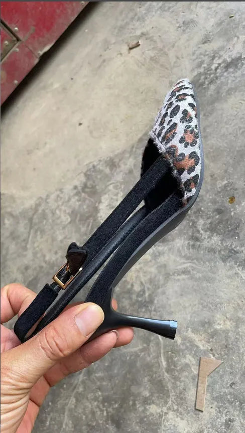 Leopard print suede women's sandals with a pointed toe and scatter heel.
