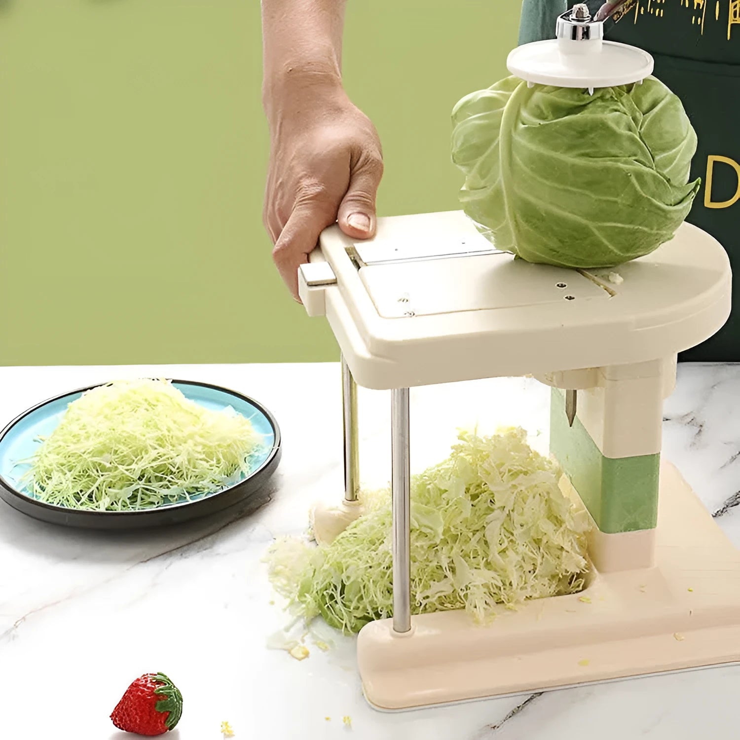 Beige-handled stainless steel vegetable slicer and grater kitchen tool