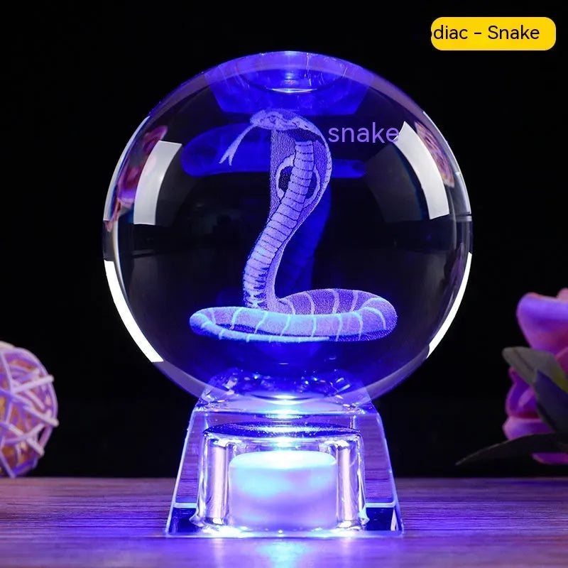 White crystal ball lamp with Chinese zodiac animal figurine on LED electronic base