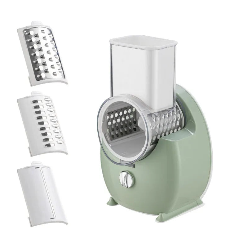 White electric vegetable slicer with suction base and multiple blades on a kitchen counter.