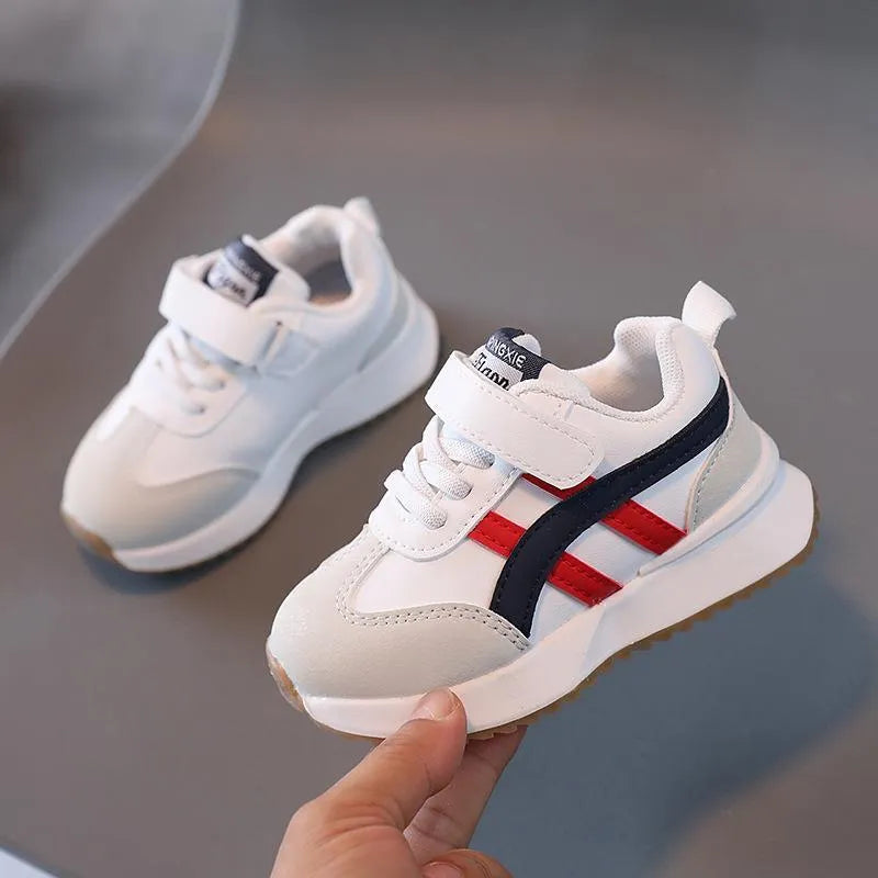Children's white synthetic leather sneakers with Velcro fastening and rubber non-slip soles