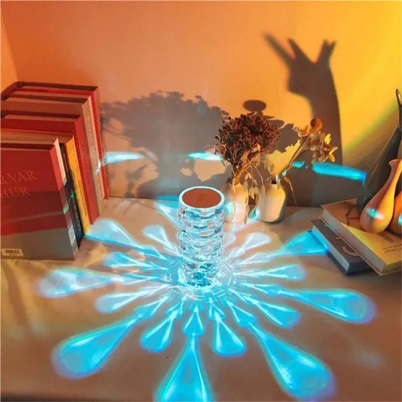 Crystal table lamp teardrop shape rechargeable night light with acrylic shade and touch control on bedside table creating warm glow