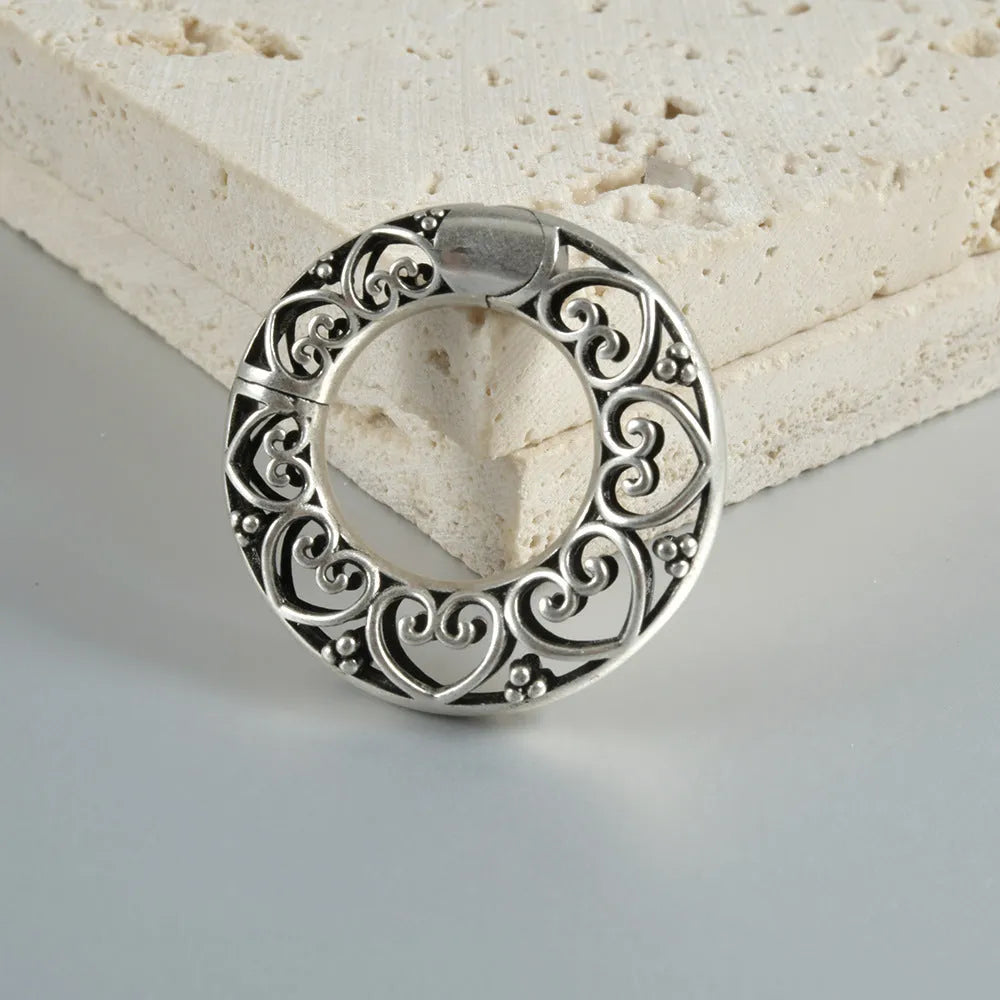 Retro magnetic earrings with hollow heart or lotus designs in antique gold or silver finishes