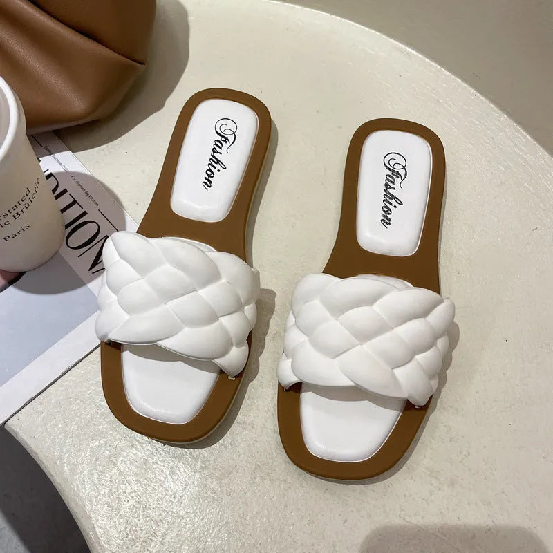 Women's PVC beach sandals with a thick non-slip sole in black, shown on a white background.