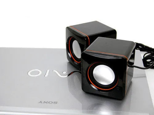 Black square USB-powered desktop computer speaker for 700B PC model.