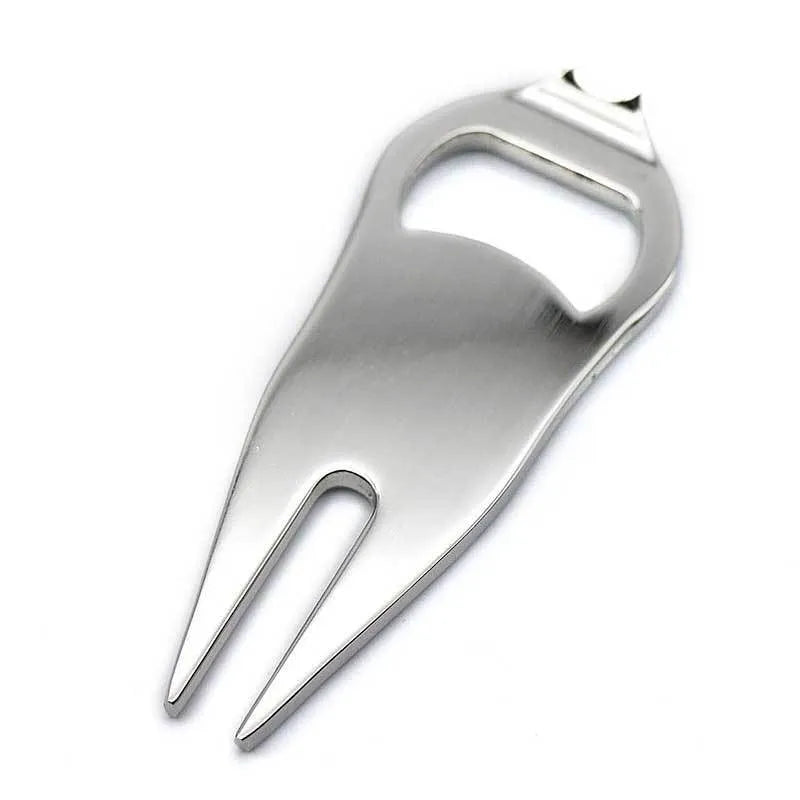 Zinc alloy golf tool with ball yoke and bottle opener, shown with a separate ball marker coin, in black, green, and silver colours.