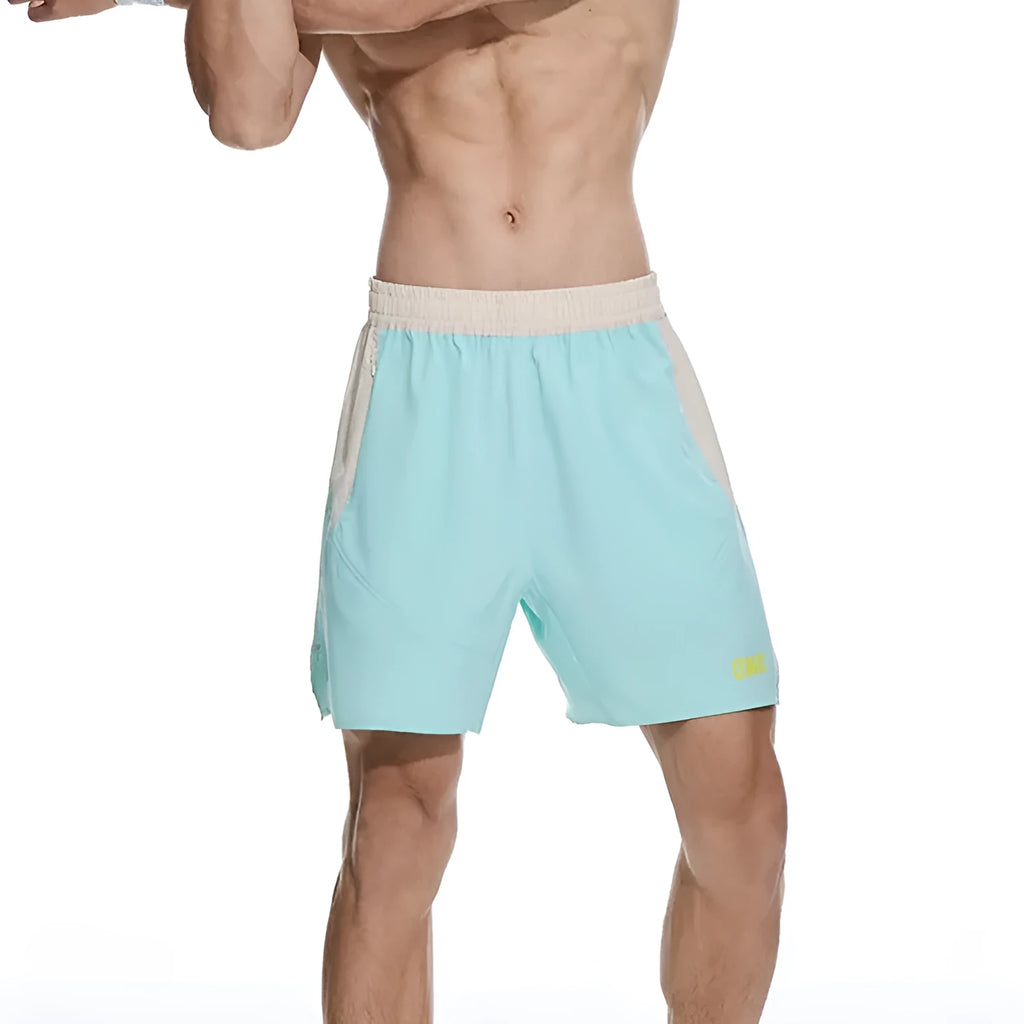 Man's loose grey workout shorts with elastic waist and lace-up fly for gym training