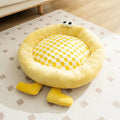 Elf Briquettes plush kennel sleeping mat in blue, pink, or yellow colours, showing raised edges and four size options