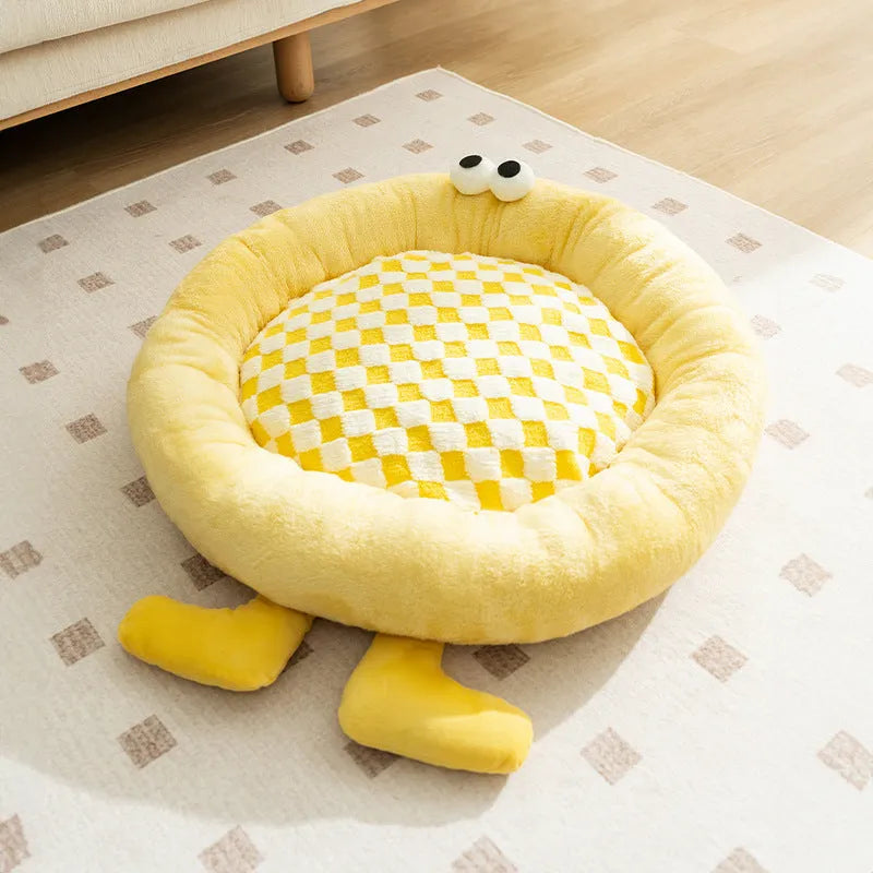 Elf Briquettes plush kennel sleeping mat in blue, pink, or yellow colours, showing raised edges and four size options