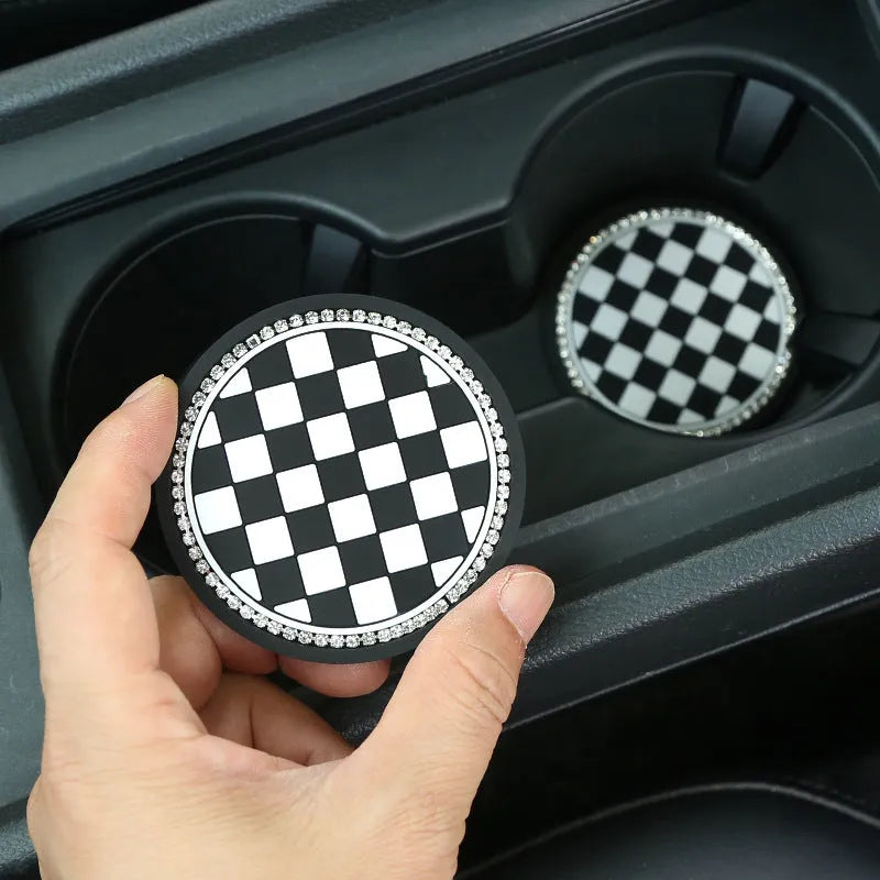 PVC plastic car cup holder mat coaster in black and white checkerboard pattern.