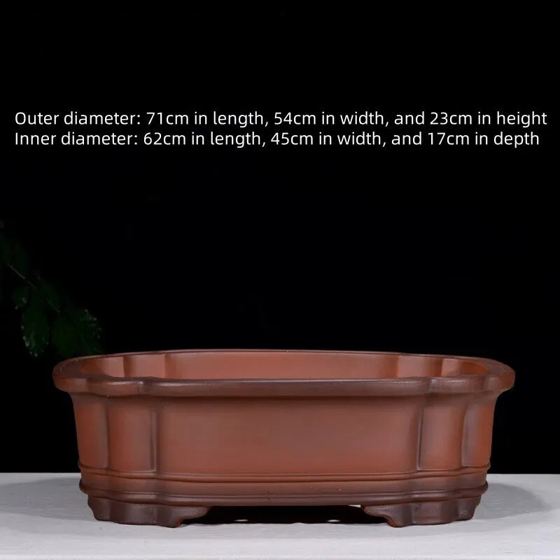 Large antique-finish purple clay Chinese style garden flower pot showing its size and deep planting cavity.