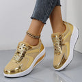 Women's gold mesh platform trainers with cross-strap and thick rubber sole