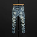 Men's slim-fit skinny jeans in dark blue denim on a neutral background.