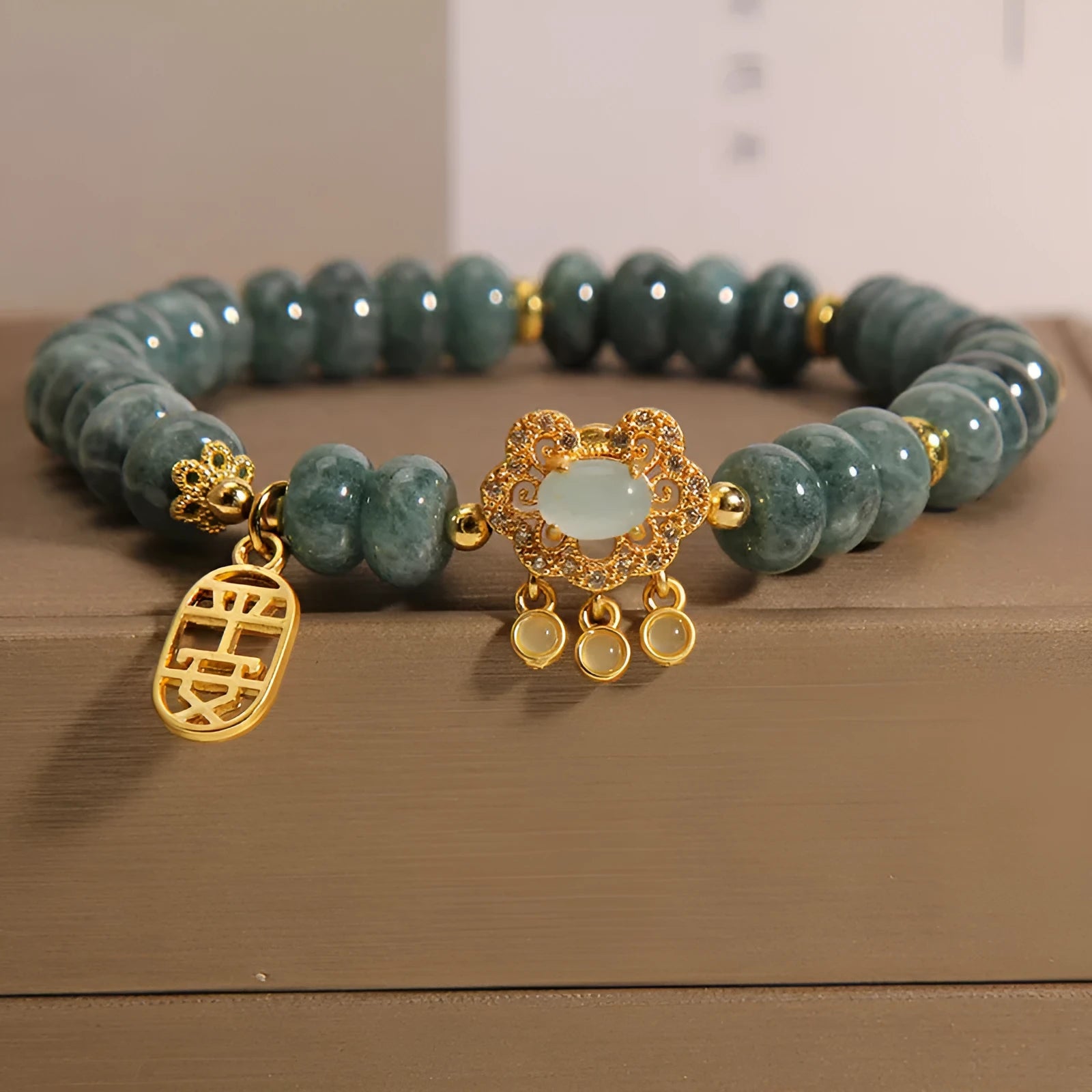 Women's bracelet with emerald jade abacus beads and alloy safety lock clasp