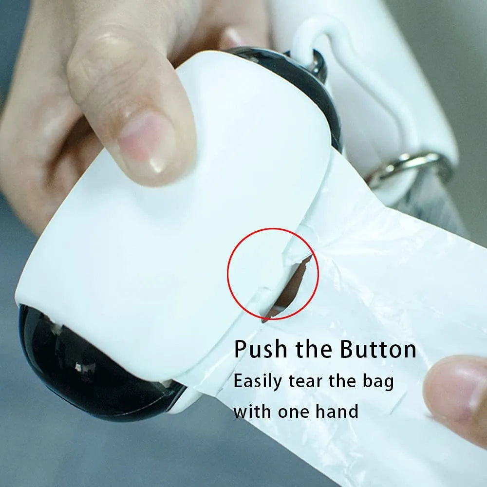 White and grey space capsule dog poop bag dispenser clipped to a leash with translucent ends showing bags inside