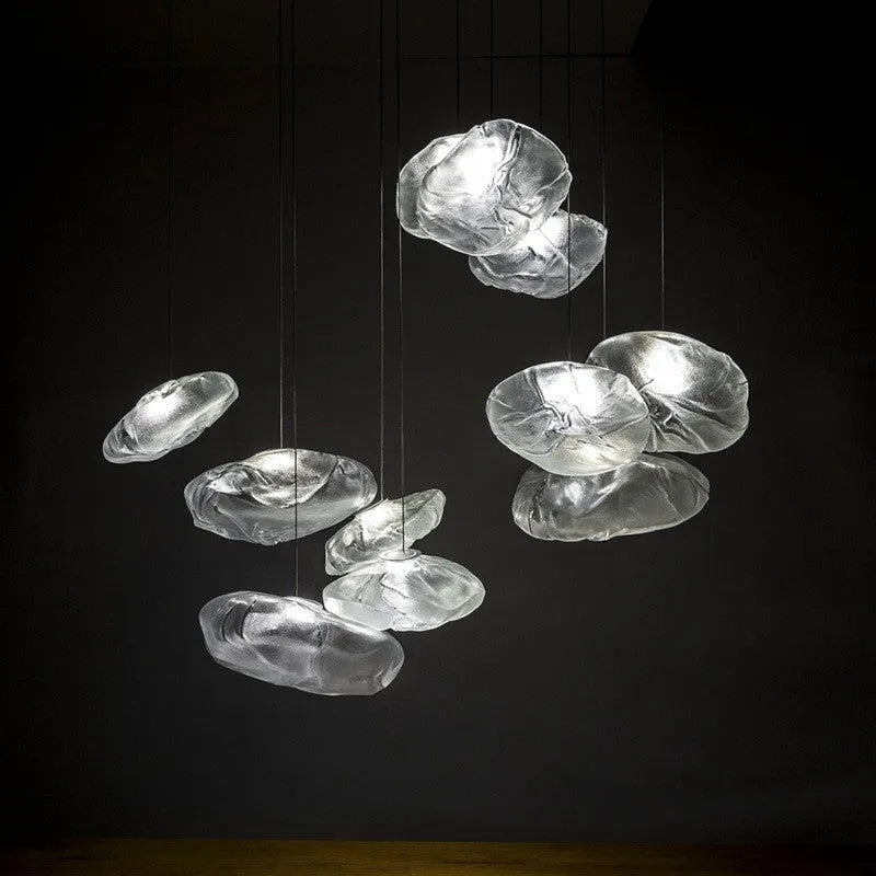 Modern fabric chandelier with glass shade in amber, clear, or smoke grey colour, shown in large and small size options.