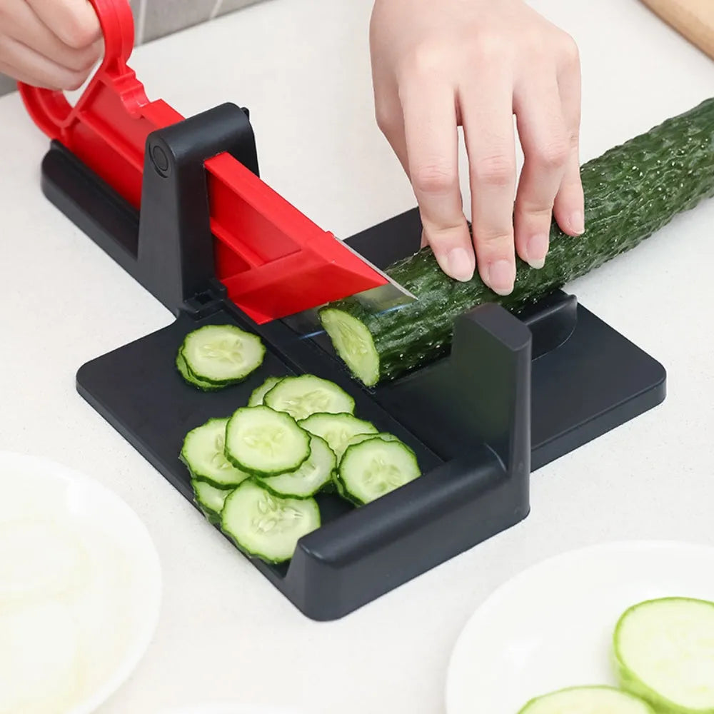 Green and red vegetable cutter with stainless steel blades for cutting carrots and potatoes