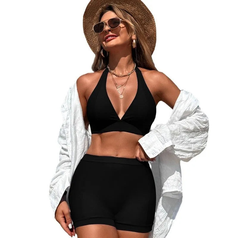 Women's two-piece nylon bikini swimsuit in black, pink, purple blue, or sapphire blue for swimming.