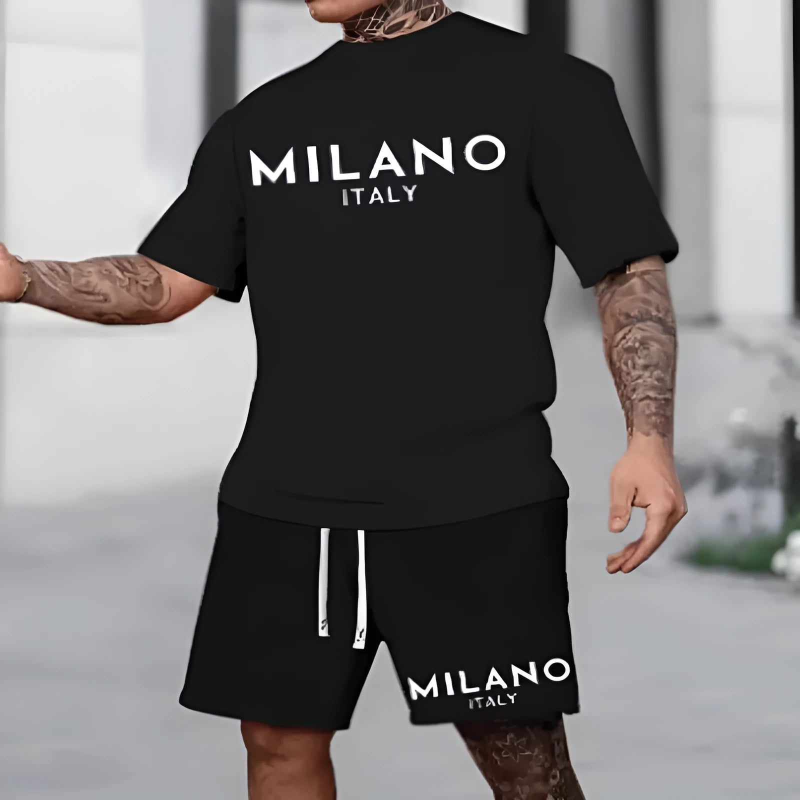 European style short sleeve polyester suit with round neck top and matching shorts in various colours