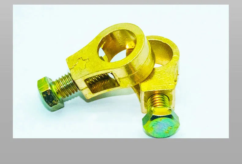 Pure copper automotive battery clamp with patented clip for terminal connection.