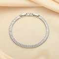 Women's geometric brass bracelet with full diamond zircon look in quadrilateral design