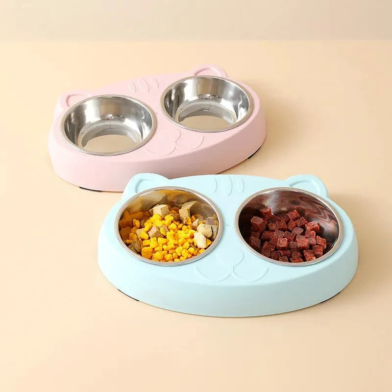 Macaron-shaped plastic pet feeder tray with two bowls in blue, green, or pink colour options