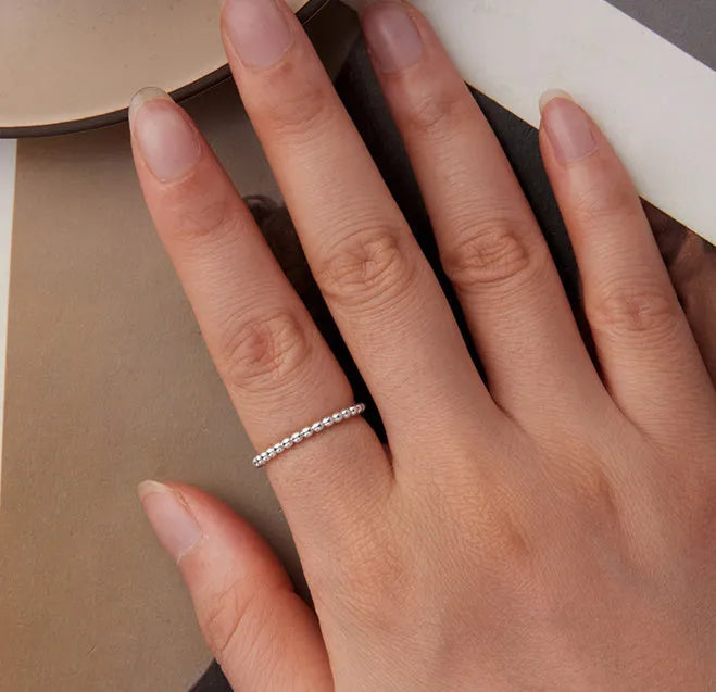 Silver bead ring with geometric shape and polka dot detail, stackable women's ring in sizes 6, 7, and 8.