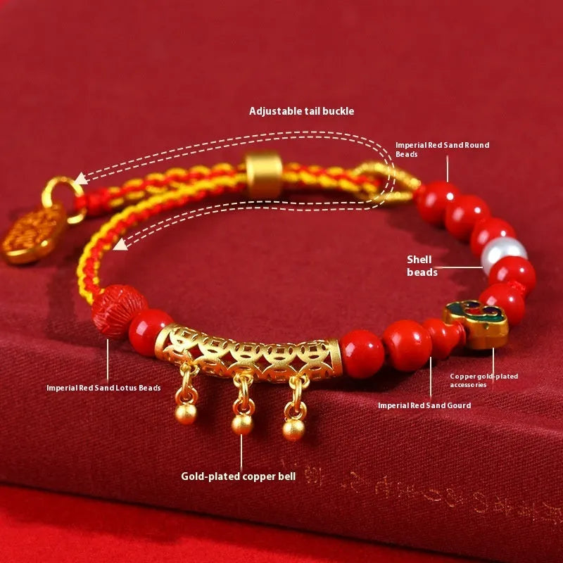 Women's hand-woven cinnabar red sand bell bracelet with round geometry design on neutral background