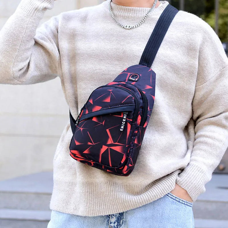 Blue Oxford cloth sling bag with a crossbody strap, earphone hole, and zipper pocket.