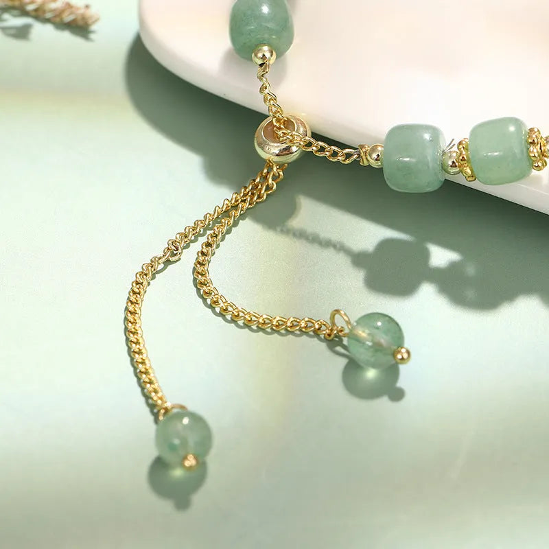 Rabbit bracelet with green aventurine and strawberry quartz beads, copper plating and gold accents