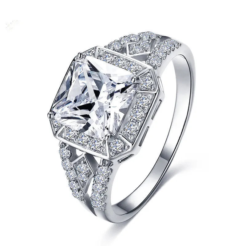 Women's platinum-coloured zircon ring with hollow geometric design and quadrilateral patterns