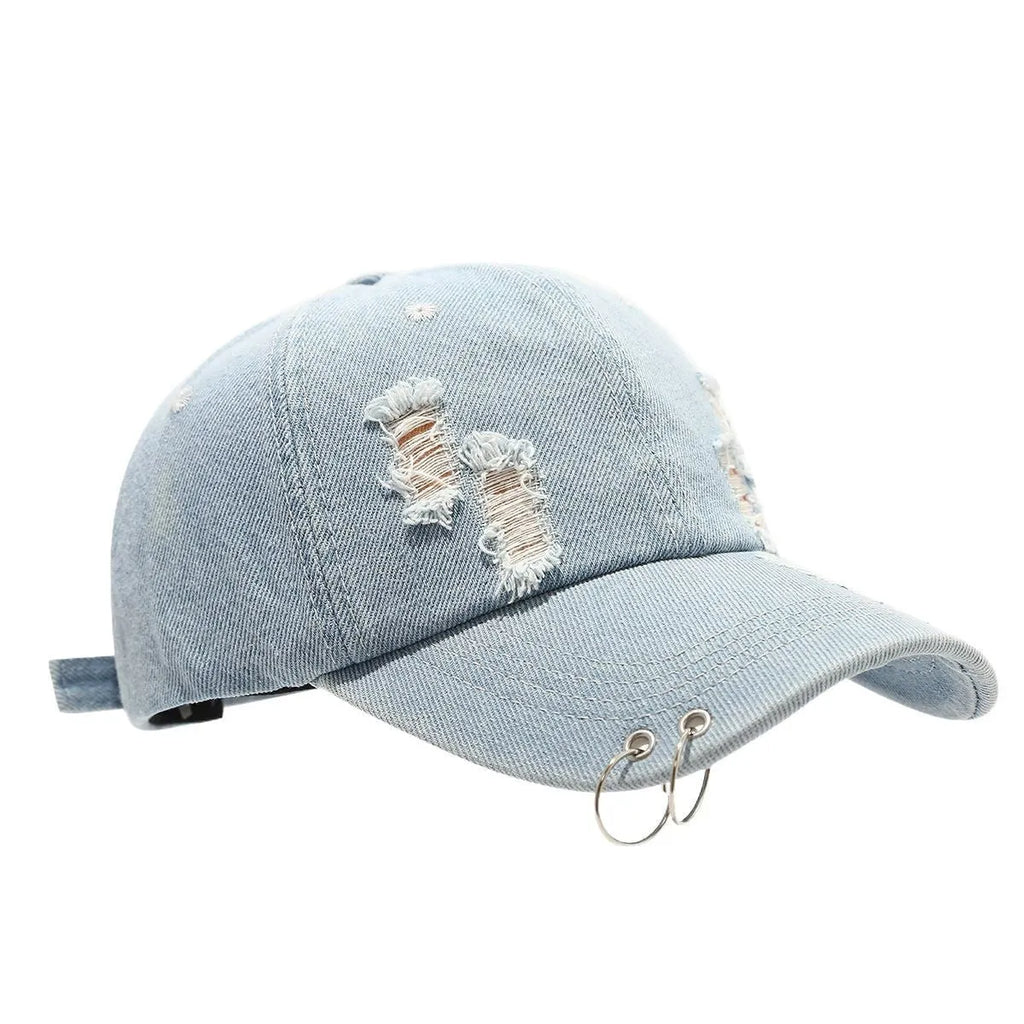 Men's adjustable denim peaked cap in black, shown from the side on a mannequin head
