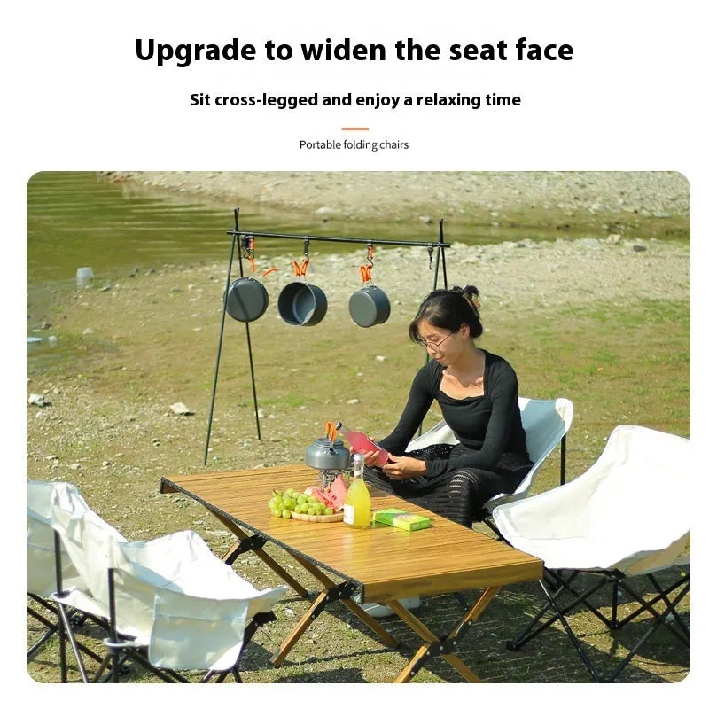 Steel-framed folding chair with Oxford cloth seat in outdoor setting