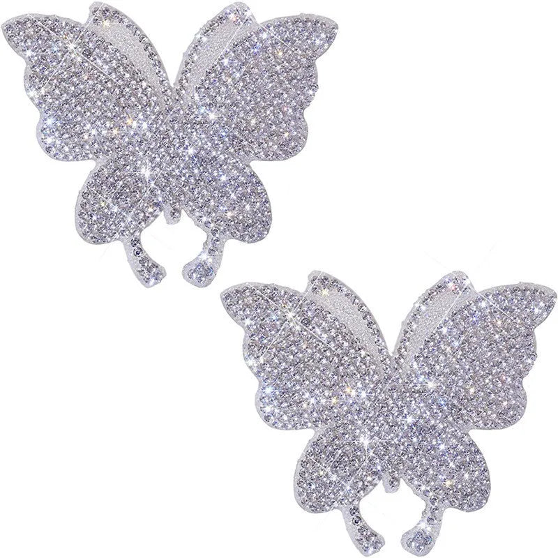 White diamond glass car sticker with butterfly and bear claw design, 7cm by 6cm.