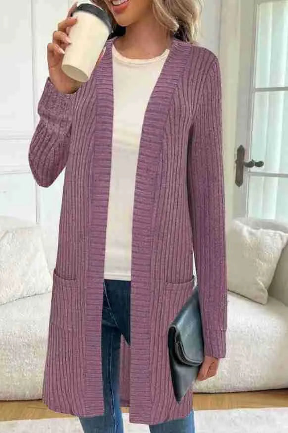 Loose fit grey knitted cardigan jacket with long sleeves and patch pockets on a hanger.