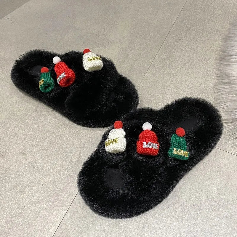 Women's Christmas hat slippers in faux plush with cotton lining and rubber sole.