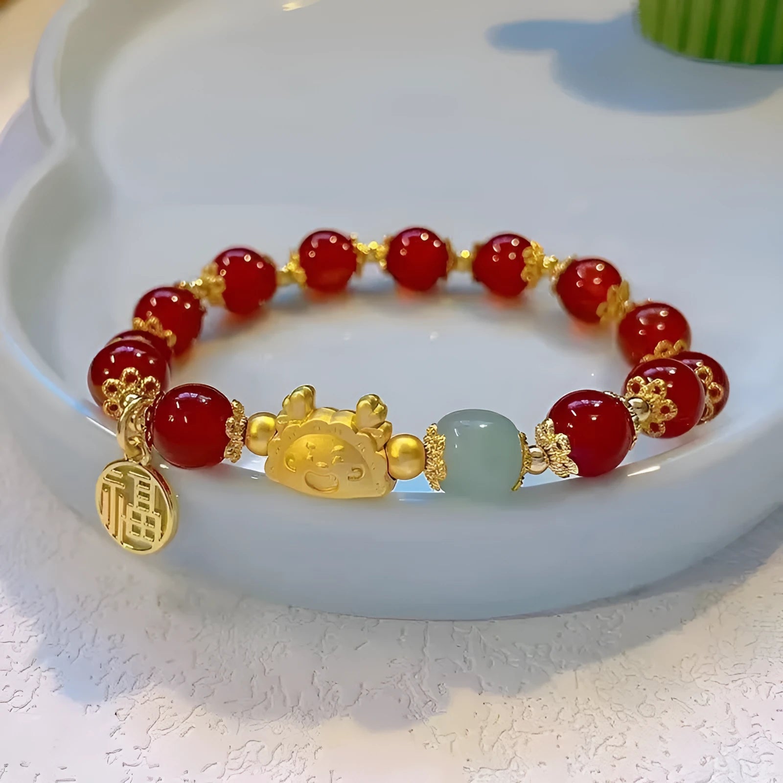 Women's glazed bracelet with floral ice crack pattern and zodiac animal modelling in electroplated finish