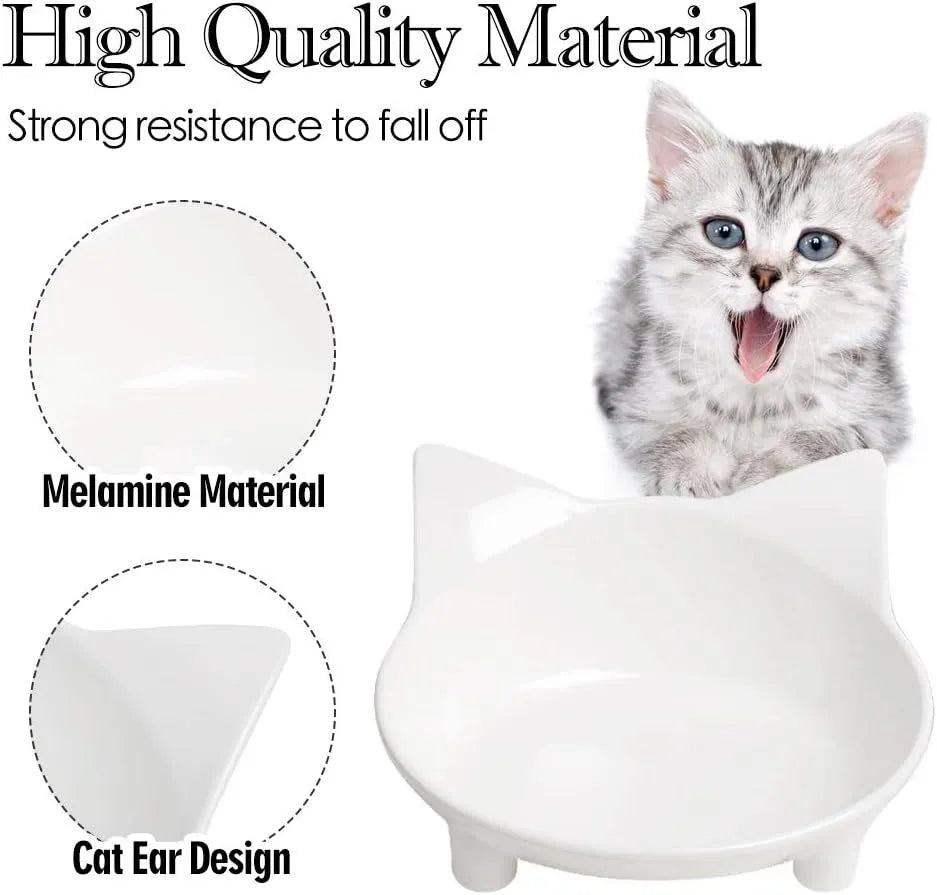 Shallow white melamine cat bowl with non-slip rubber base on a floor