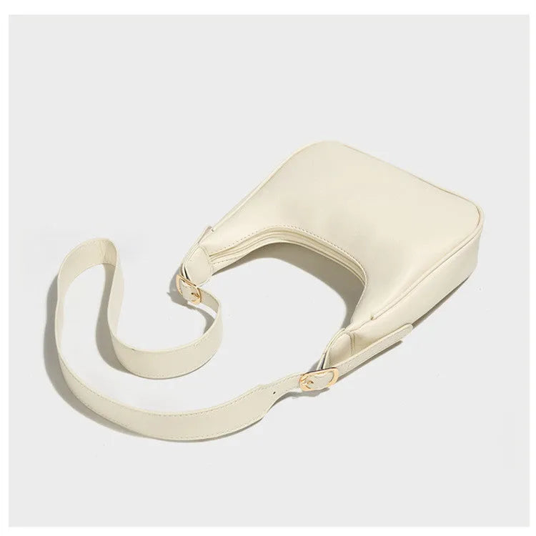 Simple all-match crescent PU crossbody bag in black with single shoulder strap and open outer pocket for women