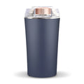 Blue stainless steel mini flour mill and grain grinder machine on a kitchen countertop.