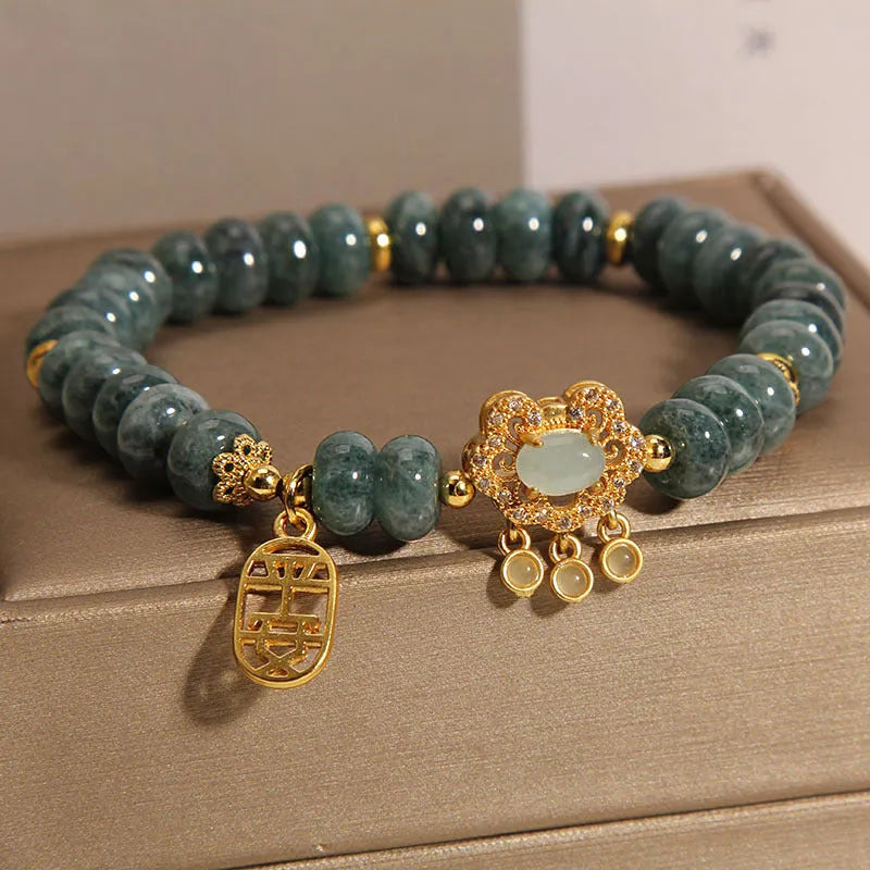 Women's bracelet with emerald jade abacus beads and alloy safety lock clasp