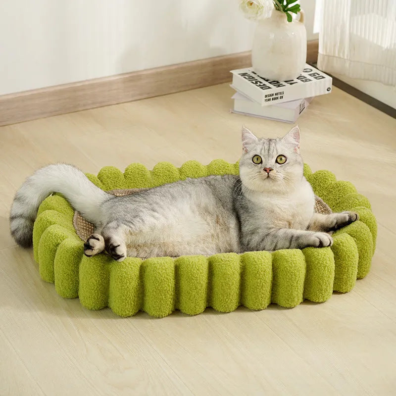 Green oval cat scratching pad and bed made from sisal material