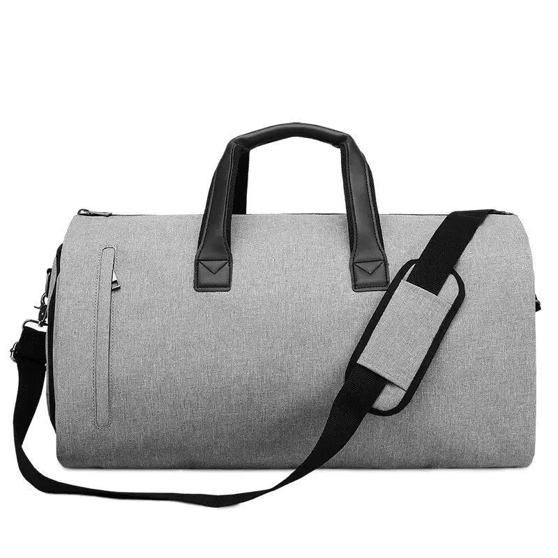 Medium oval travel bag in light grey with internal organiser pouches and a soft handle.