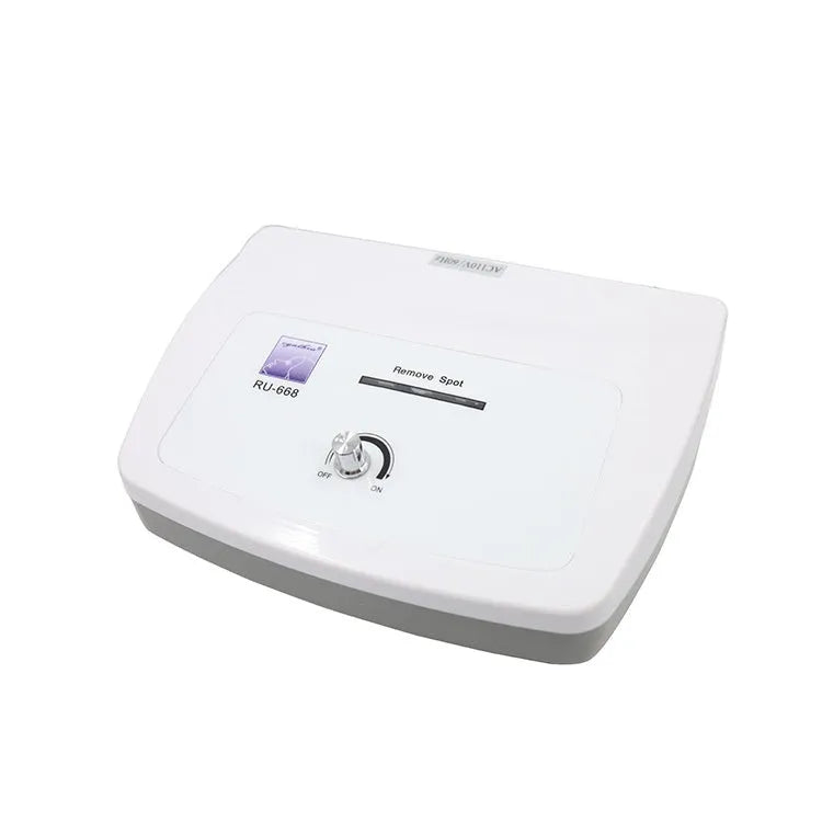 White professional spot removal pen for beauty salons with multiple power adapter compatibility
