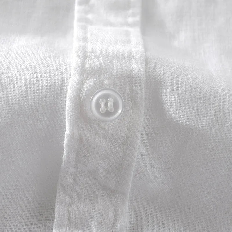 Man wearing a short sleeve apricot coloured loose-fit linen blend casual shirt.